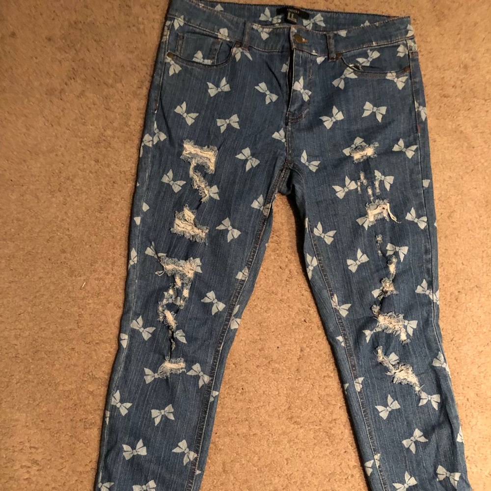 Design ripped Blue Jeans